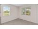 Bright room with large windows, offering a serene view, complemented by tile flooring throughout at 4892 Nw 39Th Loop, Ocala, FL 34482