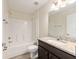 Modern bathroom features updated granite countertops and white tiling at 5425 Pecan Rd, Ocala, FL 34472