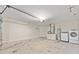 Spacious garage with ample room for laundry, appliances, and vehicles at 5425 Pecan Rd, Ocala, FL 34472