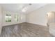 Living room with vaulted ceiling and stylish floors at 5425 Pecan Rd, Ocala, FL 34472