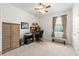 Bedroom featuring a desk area, a window, a closet, and neutral carpeting at 6265 Sw 88Th Loop, Ocala, FL 34476