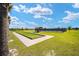 Bocce ball court next to a picnic area and other amenities for recreational enjoyment in a community setting at 6265 Sw 88Th Loop, Ocala, FL 34476