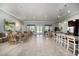 Spacious clubhouse with comfortable seating, a kitchenette, and plenty of room for social gatherings and events at 6265 Sw 88Th Loop, Ocala, FL 34476