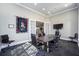 Modern conference room with a sleek table, leather chairs, and large-screen TV for presentations and meetings at 6265 Sw 88Th Loop, Ocala, FL 34476