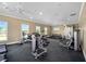Well-equipped gym with modern machines and ample space for a complete fitness routine with natural light at 6265 Sw 88Th Loop, Ocala, FL 34476