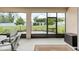 Relaxing screened lanai with comfortable seating and views of the private backyard, ideal for outdoor entertaining at 6265 Sw 88Th Loop, Ocala, FL 34476