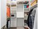 Organized walk-in closet with built-in shelving, drawers, and ample storage space at 6265 Sw 88Th Loop, Ocala, FL 34476
