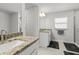 Bright bathroom with granite countertops, modern fixtures, and a separate shower at 6680 Sw 179Th Court Rd, Dunnellon, FL 34432