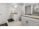 Bathroom features double vanities with granite countertops and modern fixtures at 6680 Sw 179Th Court Rd, Dunnellon, FL 34432