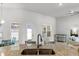 Kitchen island featuring granite countertops and a stainless steel sink, perfect for food preparation and entertaining at 6680 Sw 179Th Court Rd, Dunnellon, FL 34432