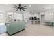 Open-concept living room flows into the kitchen, creating a spacious and inviting atmosphere at 6680 Sw 179Th Court Rd, Dunnellon, FL 34432