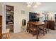 Open dining area includes storage and comfortable seating at a wooden table at 688 Midway Dr # B, Ocala, FL 34472