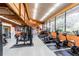 Community gym featuring treadmills and weight-lifting equipment with views from the large windows at 688 Midway Dr # B, Ocala, FL 34472