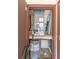 Small utility closet with water heater and space for storage at 688 Midway Dr # B, Ocala, FL 34472