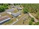 Expansive backyard with white fence and gazebo in this home situated in a quiet neighborhood at 7 Pecan Drive Ter, Ocala, FL 34472