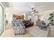 Spacious living area featuring modern furnishings and easy access to the kitchen and outdoor spaces at 7263 Sw 99Th Cir, Ocala, FL 34481