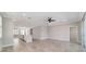 Open living space featuring tile floors, recessed lighting, and easy access to the kitchen and outdoor areas at 7987 Sw 89Th Cir, Ocala, FL 34481
