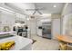 Functional kitchen featuring white cabinets, stainless steel appliances, and a cozy breakfast nook at 8137 Sw 117Th Loop, Ocala, FL 34481
