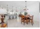 Bright and open dining area with a view into the kitchen and living spaces at 8809 Sw 61St Loop, Ocala, FL 34481