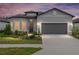 Charming single-story home with a well-manicured front yard and a two-car garage at 8809 Sw 61St Loop, Ocala, FL 34481