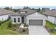 Charming single-story home with a well-manicured front yard and a two-car garage at 8809 Sw 61St Loop, Ocala, FL 34481