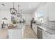 Well-appointed kitchen with stainless steel appliances, granite countertops and island at 8809 Sw 61St Loop, Ocala, FL 34481