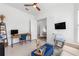 Light-filled office with a modern desk and view to entryway and living space at 8809 Sw 61St Loop, Ocala, FL 34481