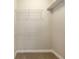 Walk-in closet with wire shelving and neutral carpet at 9777 Sw 63Rd Loop, Ocala, FL 34481