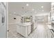 Kitchen with an island, stainless appliances and open to the living area at 9777 Sw 63Rd Loop, Ocala, FL 34481