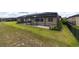 Backyard featuring a screened-in pool with a hot tub at 9777 Sw 63Rd Loop, Ocala, FL 34481
