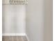 Narrow walk-in closet with white walls and wire rack shelving at 9777 Sw 63Rd Loop, Ocala, FL 34481