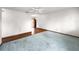 Bright bedroom featuring a ceiling fan, chandelier, and hardwood floors at 10520 Sw 85Th Ter, Ocala, FL 34481
