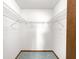Walk-in closet with ample shelving at 10520 Sw 85Th Ter, Ocala, FL 34481