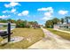 Charming home with a lush lawn and mature trees, offering great curb appeal at 10520 Sw 85Th Ter, Ocala, FL 34481