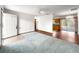 Open-concept living room with hardwood floors and plenty of natural light at 10520 Sw 85Th Ter, Ocala, FL 34481