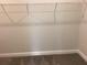 Spacious walk-in closet with installed shelving for easy organization at 10540 Sw 49Th Avenue Rd, Ocala, FL 34476