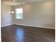Bright dining room with tile flooring and modern chandelier at 10540 Sw 49Th Avenue Rd, Ocala, FL 34476
