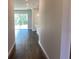 Hallway with tile floors leading to backyard at 10540 Sw 49Th Avenue Rd, Ocala, FL 34476