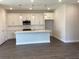 Bright kitchen with a breakfast bar island and stainless steel appliances at 10540 Sw 49Th Avenue Rd, Ocala, FL 34476