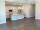 Bright kitchen with a breakfast bar island and stainless steel appliances at 10540 Sw 49Th Avenue Rd, Ocala, FL 34476