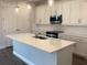 Bright kitchen with a breakfast bar island and stainless steel appliances at 10540 Sw 49Th Avenue Rd, Ocala, FL 34476