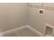Utility room featuring tile floor, white base trim and neutral wall paint at 10540 Sw 49Th Avenue Rd, Ocala, FL 34476