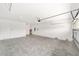 Spacious two car garage with painted walls and concrete floor at 10625 Sw 98Th Pl, Ocala, FL 34481