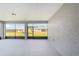 Screened lanai features neutral paint and a view of the backyard at 10625 Sw 98Th Pl, Ocala, FL 34481