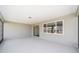 Covered and screened lanai is bright and has a view of the yard at 10625 Sw 98Th Pl, Ocala, FL 34481