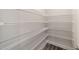 Walk-in pantry with wire shelving offers plenty of storage space at 10625 Sw 98Th Pl, Ocala, FL 34481