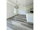 Kitchenette with stone counters and wood-look flooring at 12282 Sw 80Th St, Dunnellon, FL 34432