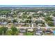 Aerial view of a residential neighborhood with tree-lined streets and well-maintained homes at 1520 Ne 17Th Ave, Ocala, FL 34470