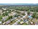 Overhead of neighborhood featuring lush greenery, diverse home styles, and quiet residential streets at 1520 Ne 17Th Ave, Ocala, FL 34470