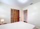 This bedroom offers a closet and neutral wall-to-wall carpeting for a relaxing retreat at 1520 Ne 17Th Ave, Ocala, FL 34470